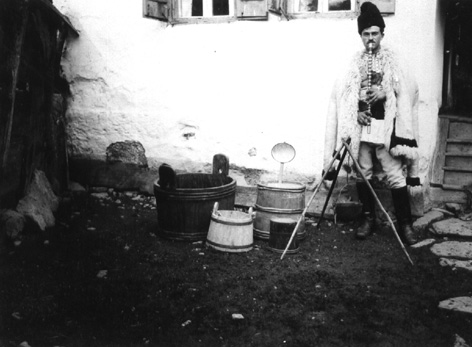 Image 2 A shepherd playing the pipe, next to sheepfold utensils, The Museum of Sibiu (Stalin region), 9 × 12 cm, early 20th century. Kiruleanu collection